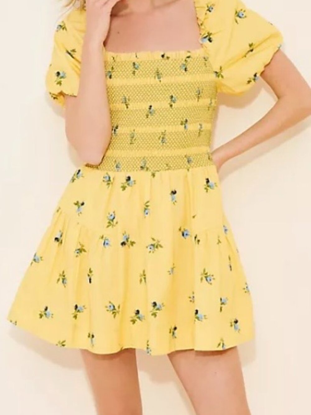 Anthropologie yellow smocked mini dress with puff sleeves
